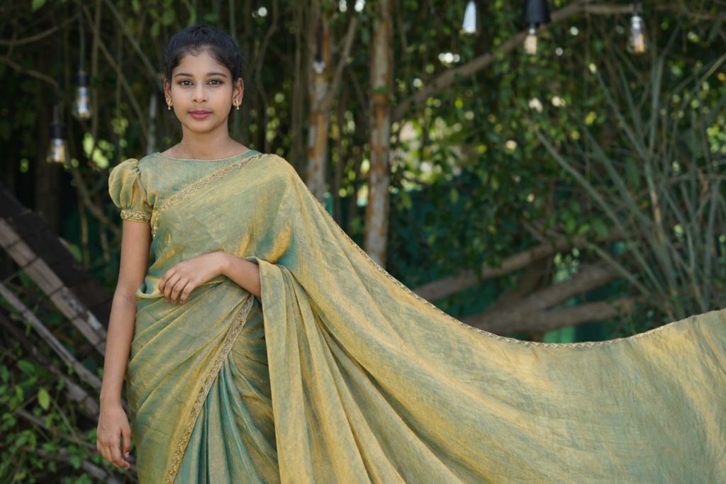 young girl in green saree